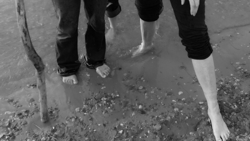 legs and feet in sea