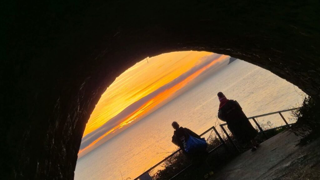 women watching sunrise